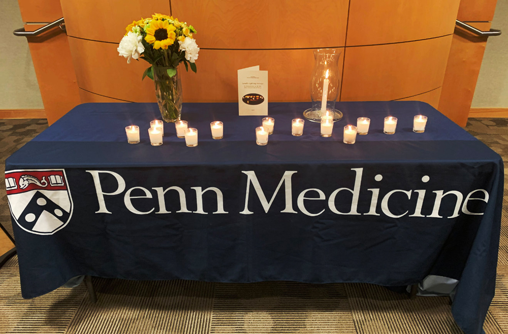 Candles lit in remembrance of patients who died of COVID-19 at Penn Presbyterian